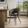 Eetkamerstoel met armleuning salon.  Tissee cargo  stof bruin