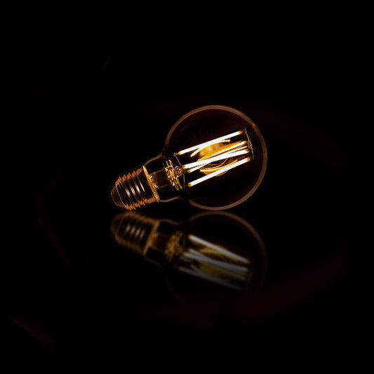 Lichtbron LED bol Ø7 cm - E27 6W warm licht / amberkleurig