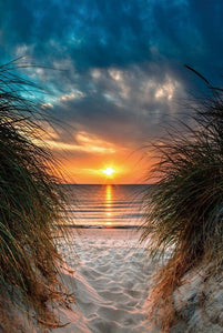 Glasschilderij zonsondergang vanaf strand 80x120 cm